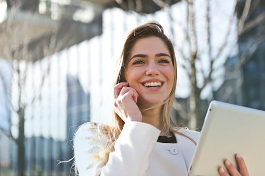 pexels-photo-789822-789822-1 Woman In White Blazer Holding Tablet Computer